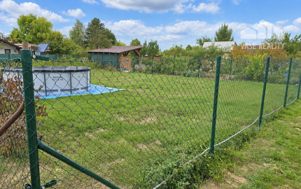 Predaj pozemku 401 m² v záhradkárskej oblasti – Drahovce Hať, Siete: Elektrina, voda, žumpa