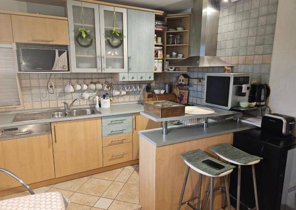 6 izbový rodinný dom v obci Mikušovce  , pozemok 1048 m2